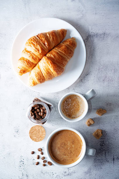 istock Cups of coffee on a white background 1347087368