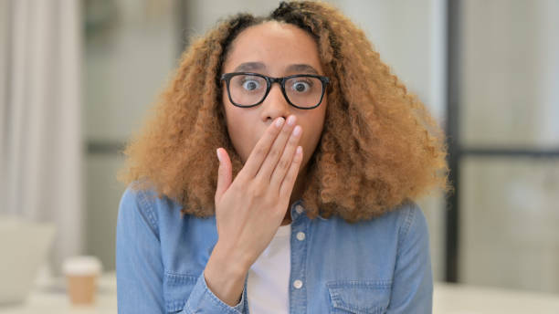 istock Shocked African Woman Wondering in awe 1347091193