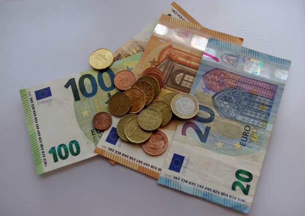 istock Euro coins and bank notes 1347092005