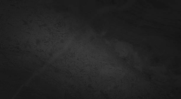 istock abstract black marble texture background. luxury Italian slab, granite texture with blank space for design. vignette limestone marble texture background with dark corners (focused at center of image). 1347093350