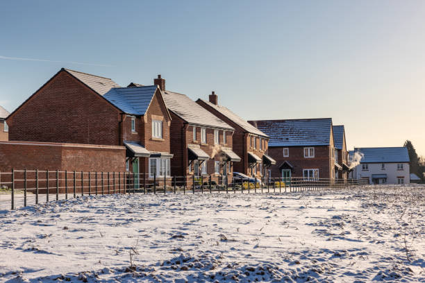istock Red bricks houses in England with snow 1347094705
