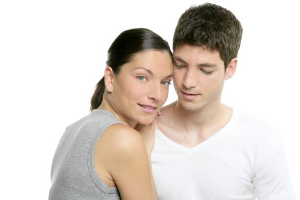 istock Beautiful young fresh modern couple hug on white 1347097882