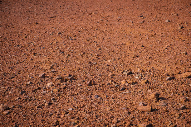 istock red sand and volcanic stones, Canary Island soil closeup - 1347100938