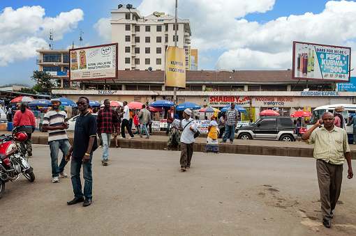 ARUSHA, TANZANIA - OCTOBER 21, 2014 : Typical street scene in Arusha. Arusha is located below Mount Meru in the eastern branch of the Great Rift Valley and the capital of the Arusha Region.