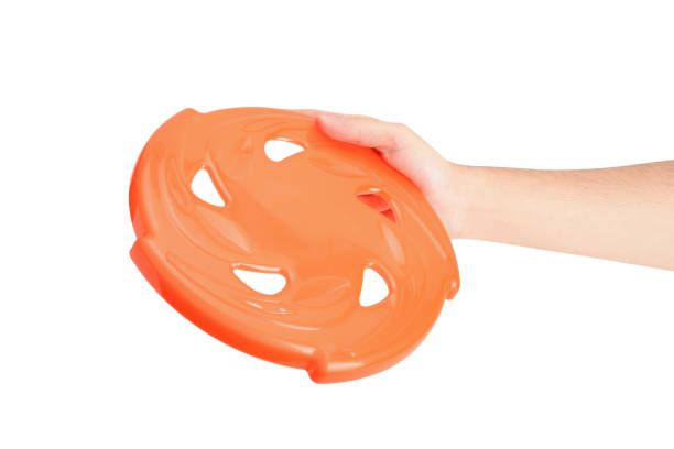 istock Hand holding frisbee (Clipping Path) on the white background 1347103128