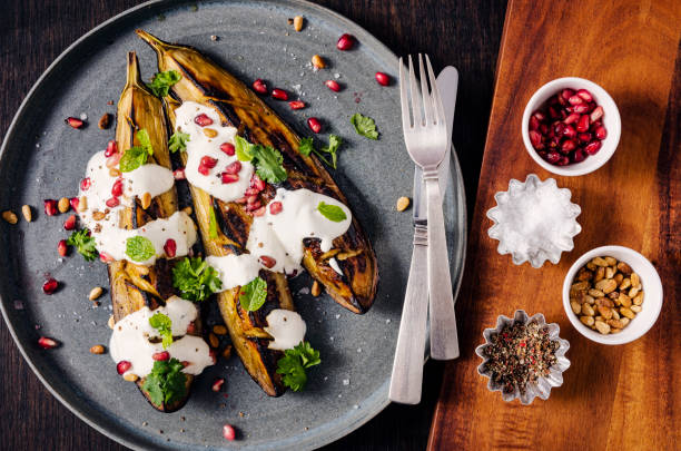istock Roasted Aubergine with Pomegranate and Greek Yoghurt 1347104484