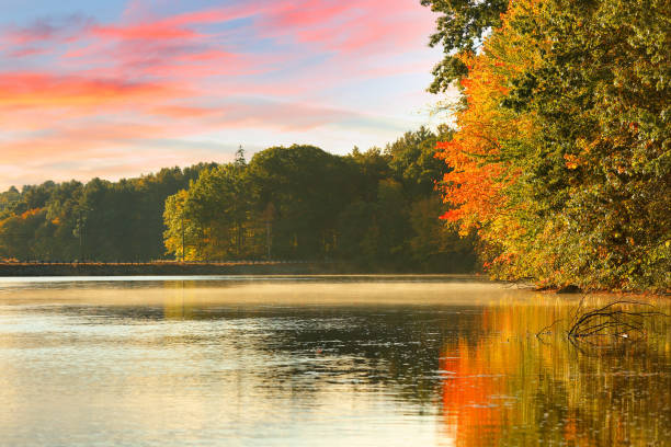 istock Beautiful New England Fall Foliage with reflections at sunrise, Boston Massachusetts. 1347107319