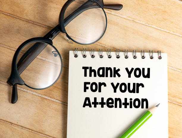 istock THANK YOU FOR ATTENTION, the words written in the notebook. 1347107339
