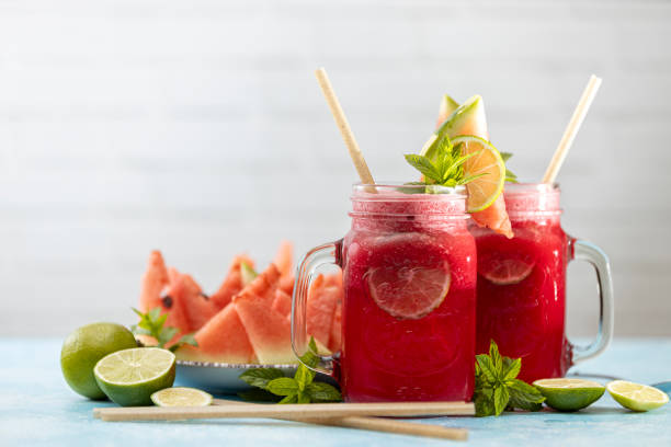 istock Watermelon mojito fresh red drink. With watermelon, lemon, lime, mint leaves and ice 1347109163