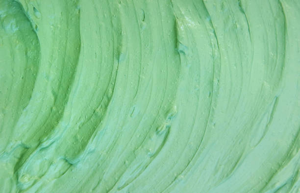 istock Cosmetic texture clay mask for face and body. Selective focus. 1347109659