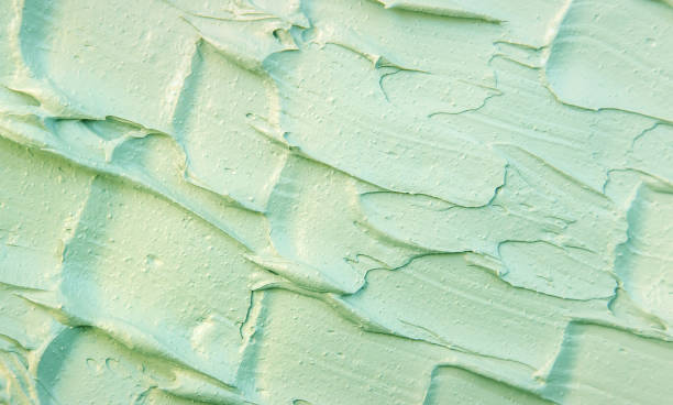 istock Cosmetic texture clay mask for face and body. Selective focus. 1347109669