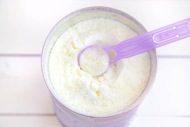 istock baby bottle with milk on white background. Selective focus. 1347109678