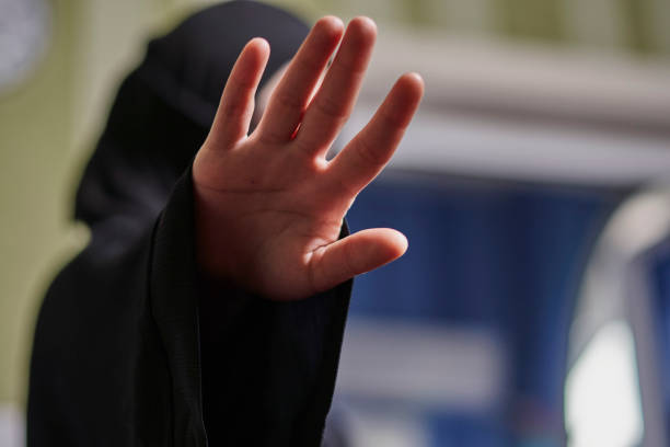 Stop domestic violence against muslim women stock photo