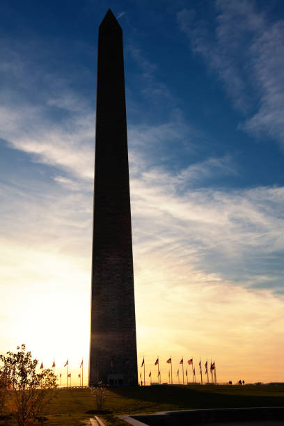 istock Washington Monument as Backlit Silhouette, Washington DC, USA. 1347114804