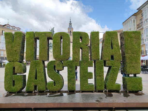 letters from the city of vitoria gasteiz made with grass on the virgen sqaure. - álava imagens e fotografias de stock