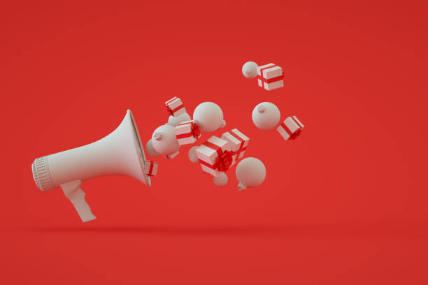 istock Megaphone with Christmas ornaments, new year red background 1347124164