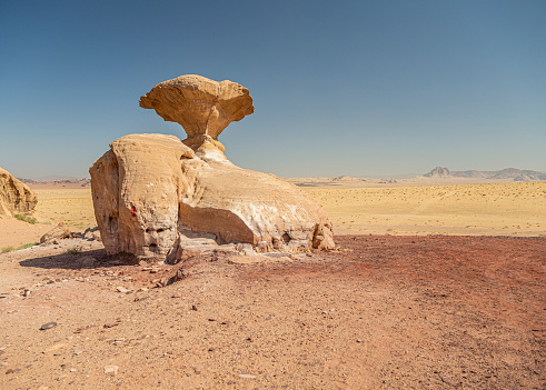 Mushroom Rock and clear blue sky in Wadi Rum desert, Middle East, Jordan.