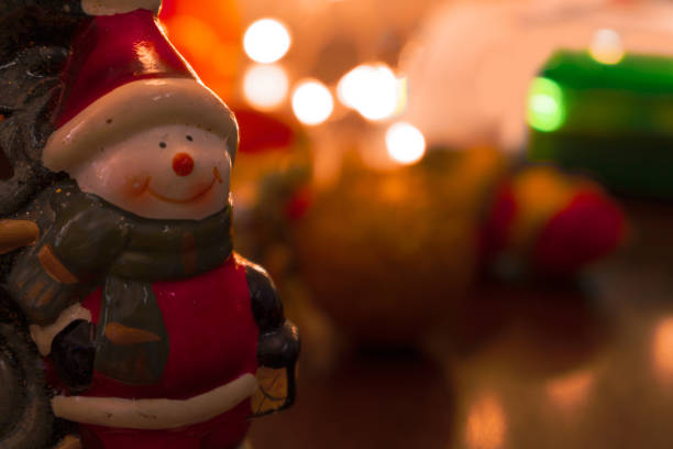 Santa Claus on blurred christmas background. Blank card for text.