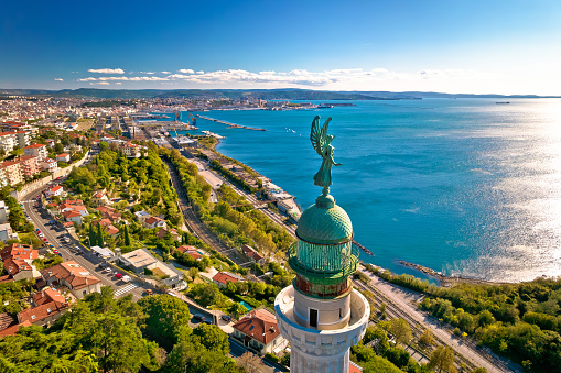 Trieste lighthouse Phare de la Victoire and cityscape panoramic aerial view