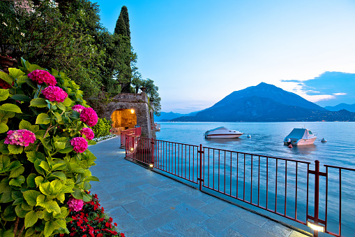 Town of Varenna scenic lakeside walkway evening view, Como lake, Lombardy region of Italy