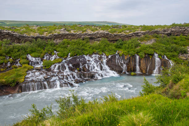 istock Hraunfossar waterfalls in borgarfjordur in Iceland 1347138497