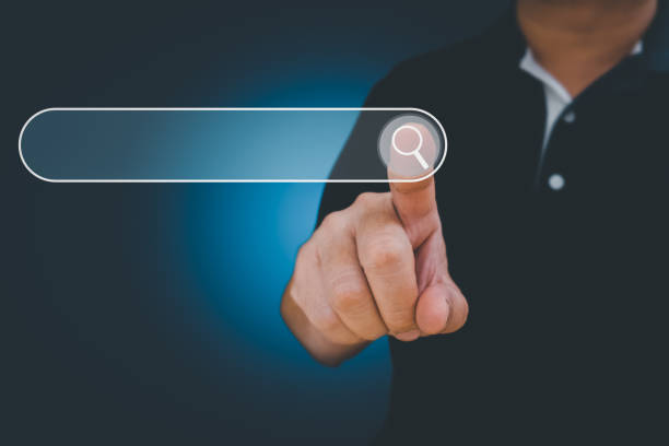 istock Business man clicking internet search page touch screen 1347140986