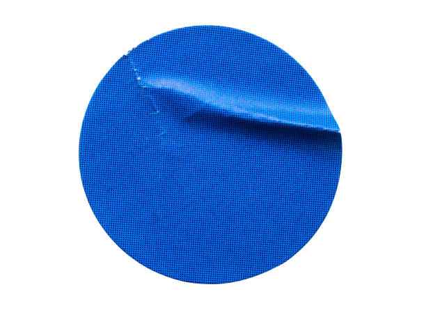 istock Blank blue round adhesive paper sticker label isolated on white background 1347145697