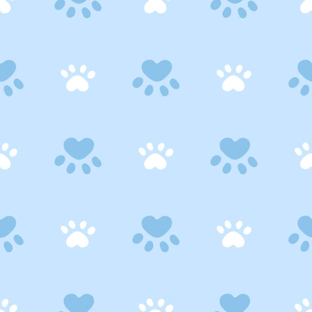 istock Blue and white cat or dog seamless pattern. Meow and cat paws background vector illustration. Cute cartoon pastel character for nursery boy baby 1347146491