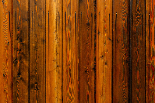 reddish and brownish wooden planks texture and background.