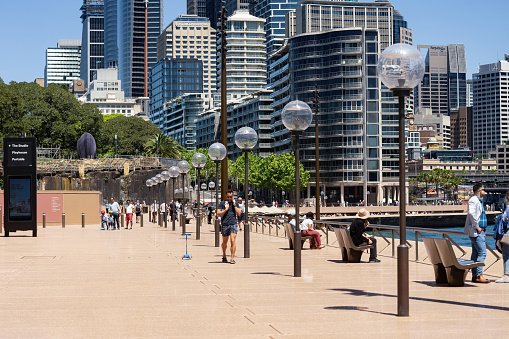 Sydney, Australia, October 17, 2021 - Sydney residents enjoy a warm spring Sunday at Circular Quay after coronavirus restrictions were lifted. Vaccinated people can visit bars and restaurants.