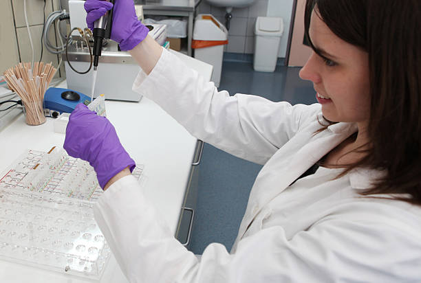 istock Beautiful technician at work in a laboratory .... blood bank 134715216
