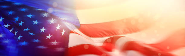 istock Close up shiny American flag with sunbeam 1347154439