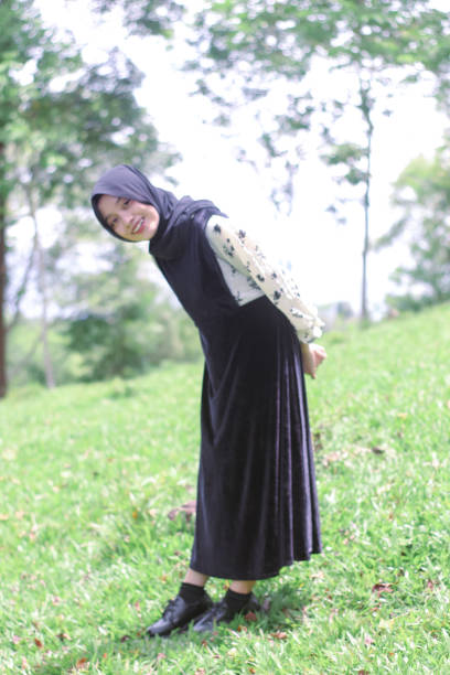 istock Young Hijab women walking enjoying at park 1347155283