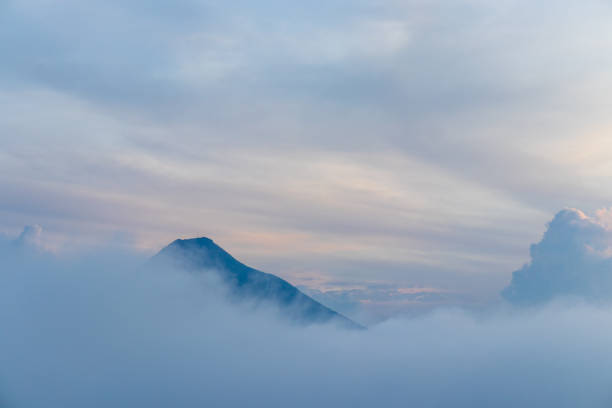 istock volcano in guatemala covered by clouds 1347157221