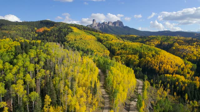 Aerial Video Of Owl Creek Pass Near Montrose, Colorado On An Autumn Day Dotted With Yellow Aspen