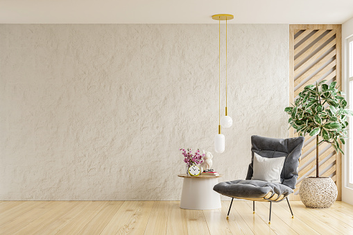 Scandinavian style living room with with armchair on empty white wall background.