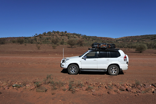 Outback Australia - May 27 2019: Toyota - Land Cruiser (120) Prado in a remote location during a road trip in Australia.Toyota Land Cruiser model is Toyota's longest running series of models