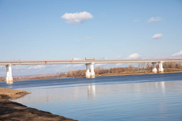Bridge over the Vyatka River in Tatarstan, Russia. Traces of rising water in high water are on the bridge supports. In the background is the city of Mamadysh.