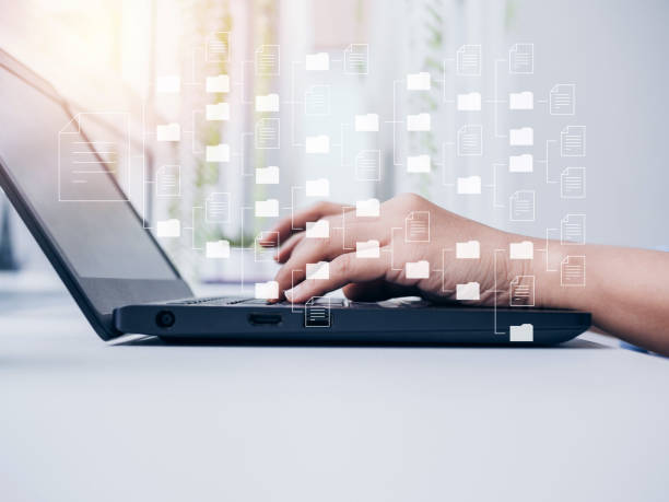 istock Document management. Document file information and folders icons with businessman hands. 1347162856