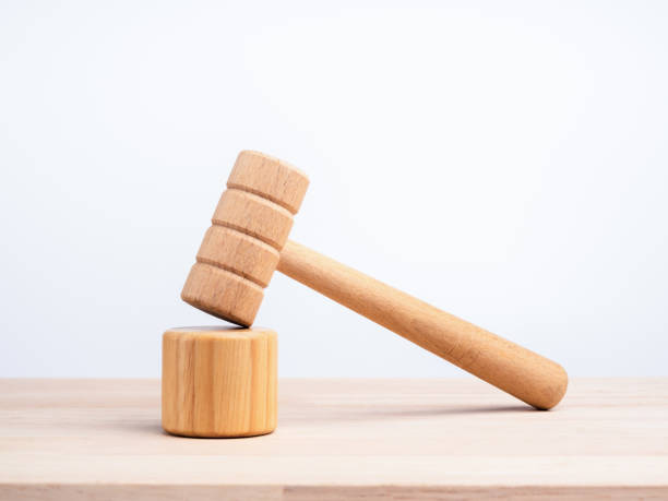 istock A wooden judge gavel and soundboard. 1347163497