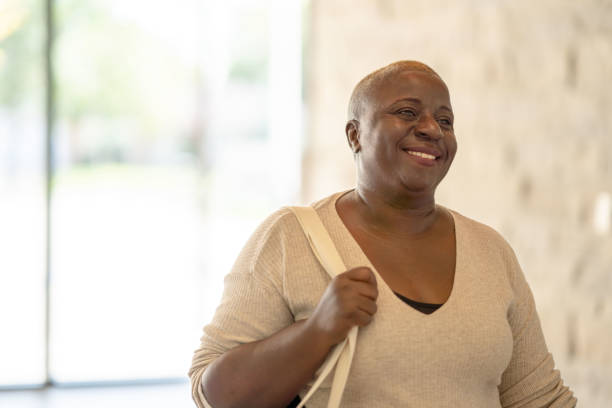 istock Senior Woman Entering a Community Center 1347163568
