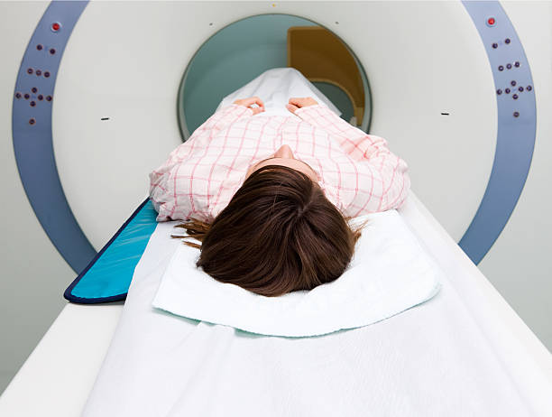 istock Young girl in a CAT scan machine waiting for exam 134716491