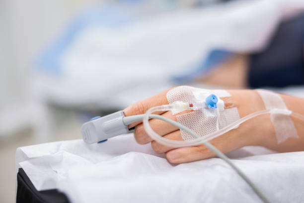 istock Close-up of medical equipment on patient's hand 1347166316