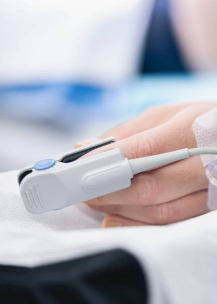 istock Pulse oximeter on patient's finger at hospital 1347167059