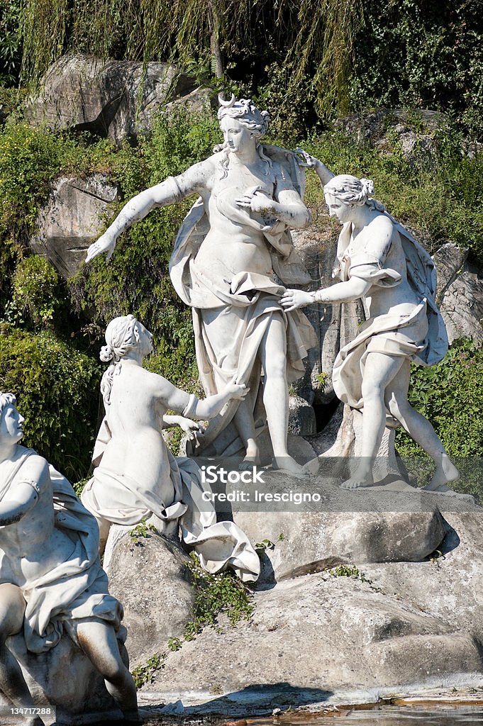 Royal Palace of Caserta - Italy Detail of one of the statues that adorn the fountain of Diana and Actaeon in the garden of the Royal Palace of Caserta. Danae Stock Photo