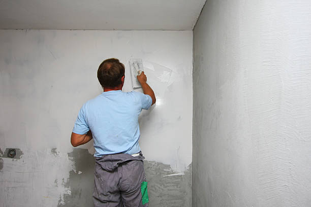 istock House painter is polishing the wall 134717335