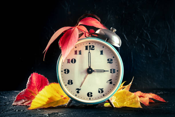 istock Daylight Saving Time concept, fall back in autumn. A vintage alarm clock 1347174716
