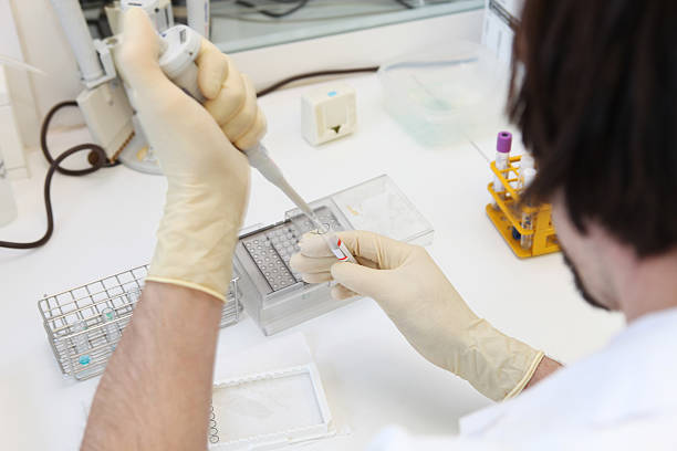 istock Technician working in a biochemical lab of blood bank 134718347