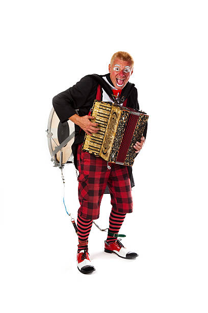 istock Clown winth accordion and drum on his back 134718853