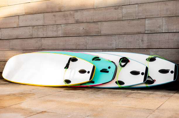 istock surfboards on the ground at sunset 1347188737